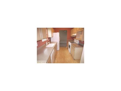 The kitchen includes all appliances, laminate floo
