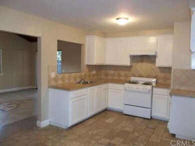 KITCHEN WITH CUSTOM TILE BACK-SPLASH, NEV STOVE AN
