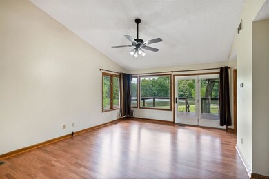 The Great Room has newer wood-laminate flooring, F
