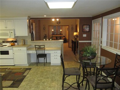 KITCHEN TO DINING ROOM TO LIVING ROOM