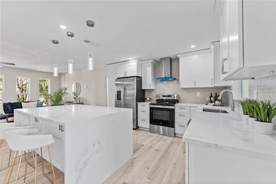Recently renovated kitchen showcasing high-end finishes and timeless design