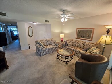 Living Room and Dining Room Combo with Sliders to