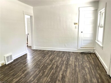 Living room with natural light and nice laminate f