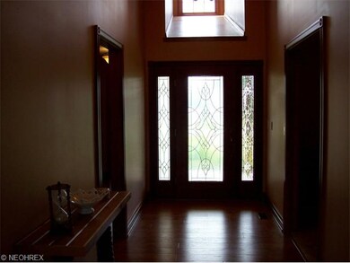 Enjoy lots of room in this spacious foyer as you w
