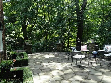 Patio/Deck. Flagstone terrace offers privacy and t
