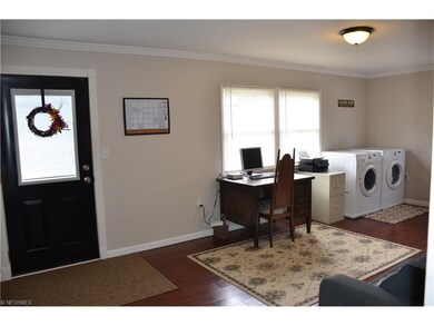1st Floor laundry and hand scraped floors!