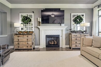 Gas burning fireplace in living room.