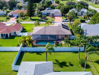 Aerial view of pool and landscaped back yard