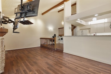 Kitchen, breakfast area and living room flow toget