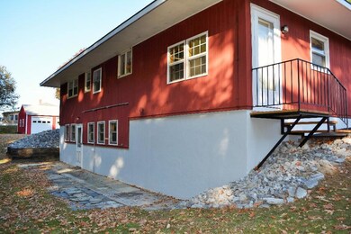 Back side of house with fresh laid...