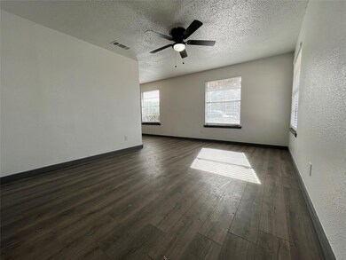 Here we see the main living area, equipped with numerous window for beautiful natural lighting.
