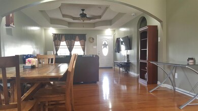 The architectural decor is present throughout the entire home. The double trey ceiling  and arched entry adds to the ambiance of the home.