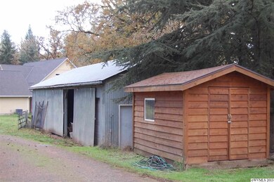 Barn includes insulated artist studio with overhea
