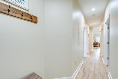 Hall featuring light hardwood / wood-style floorin