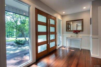 The foyer is stunning with board & batten detailin