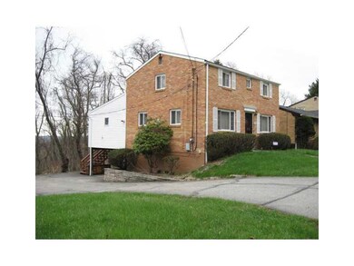 Exterior Front. Side view showing addition