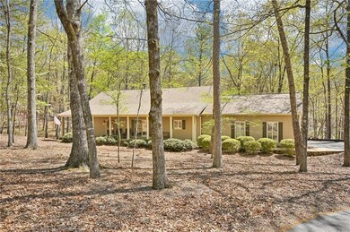 View of front of property with a shingled roof
