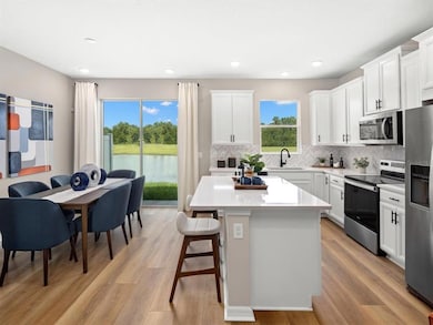 *Photo of Model Home - Kitchen*