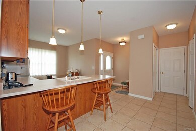 Kitchen area. Door to right leads to attached gara