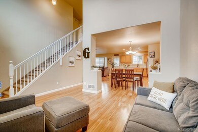 Gleaming natural finished laminate flooring greets