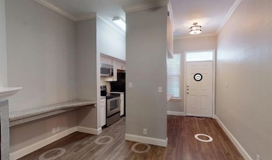 Kitchen featuring appliances with stainless steel