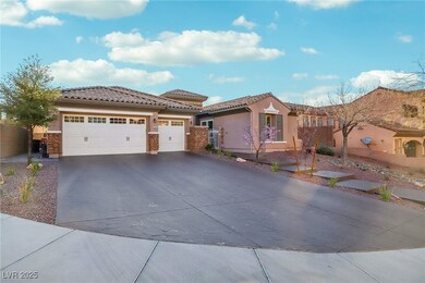 View of front of home featuring a tile roof, stucc