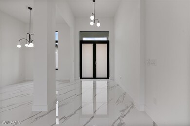 Foyer with a chandelier
