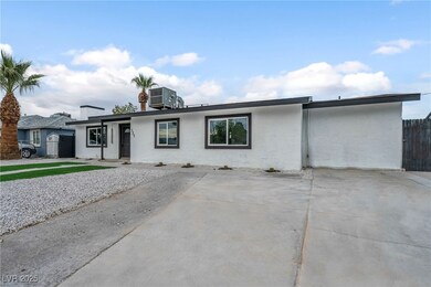 Ranch-style house with stucco siding, central AC,