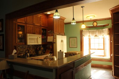 The Kitchen has been remodeled with oak cabinets t