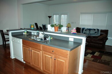 Another view of kitchen open to family room