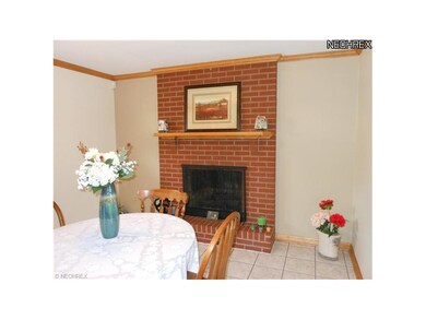 Bright and cheerful dining area is open to kitchen