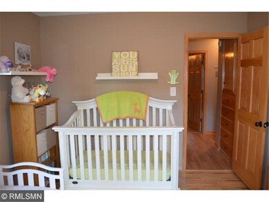 One of 2 main-level bedrooms. 6-panel doors and ne