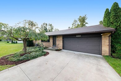 Front of house with garage