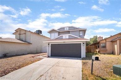 View of front of property featuring concrete drive