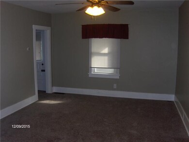 Living room. Door off living room leads to balcony