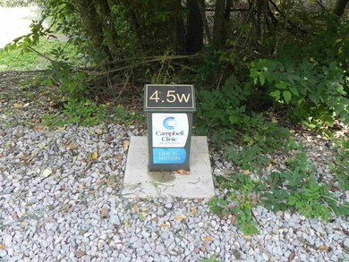 Just behind home find Greenway marker 4.5 W