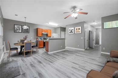 Living room, dining room, kitchen -- virtually staged