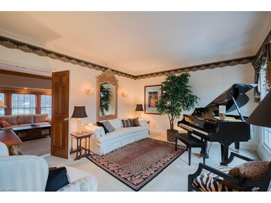 Formal Living Room/Music Room.  Double Doors lead 