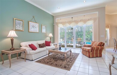 Spacious living room with french doors leading out