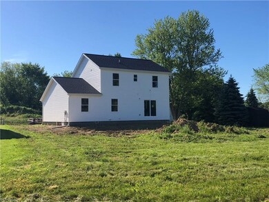 Rear view of home. Large back yard is perfect for 