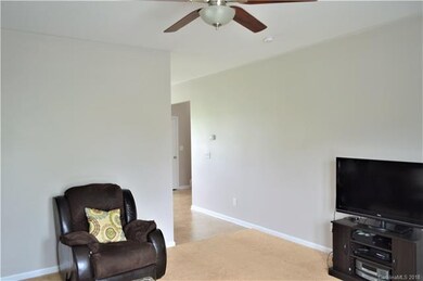 Living room leading to kitchen