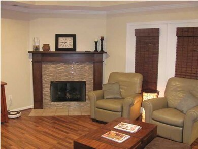 Handcrafted mantle and mosaic tile fireplace. Vent