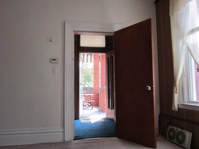 Main entrance door to the building from the yard.