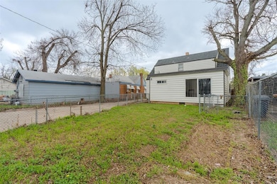 View of fenced backyard