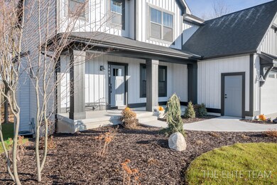 1449 Chase Farms Dr unit 22, Byron Center, MI 49315 - photo 2