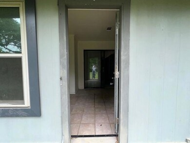 Property entrance with visible vents