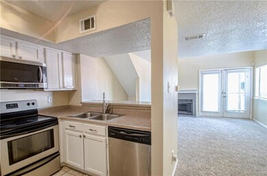Kitchen featuring appliances with stainless steel 