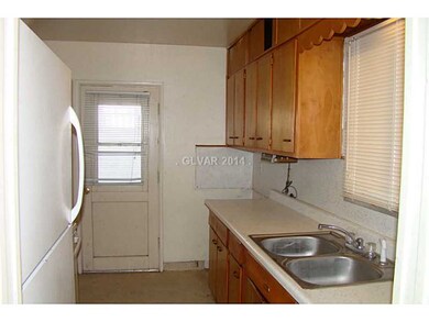 Kitchen. Kitchen also has a side entry door.