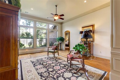 FORMAL LIVING ROOM WITH TRIPLE CROWN MOLDING AND W