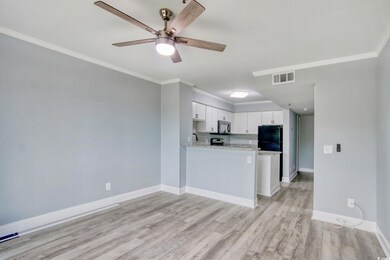 Kitchen featuring stainless steel appliances, ligh